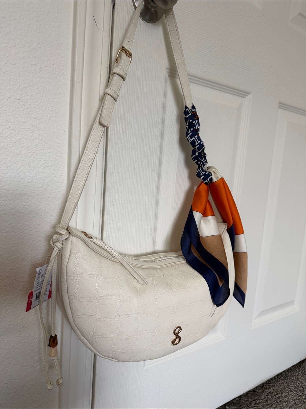 Cream Quilted Crescent Shoulder Bag with Navy-Orange Scarf Accent